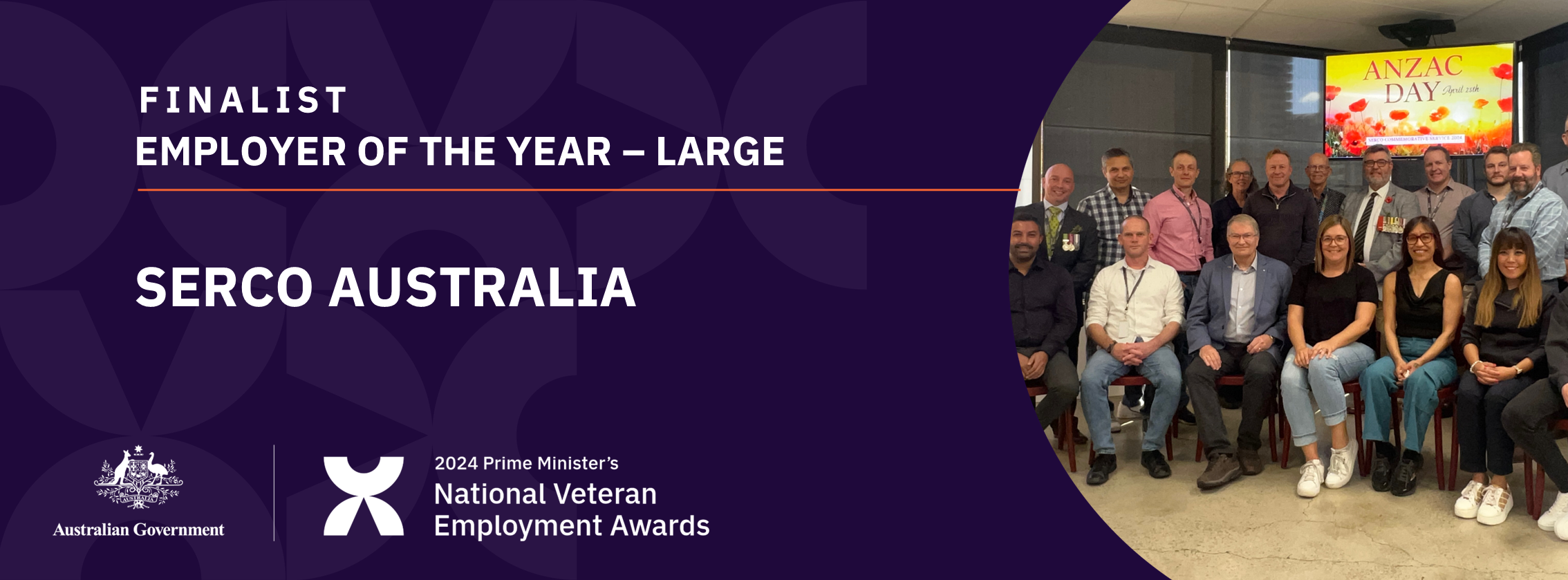 White text on dark purple background: Finalist Employer of the year - large - Serco Australia - with a photo of a group of smiling people in two rows in front a screen with ANZAC DAY on it