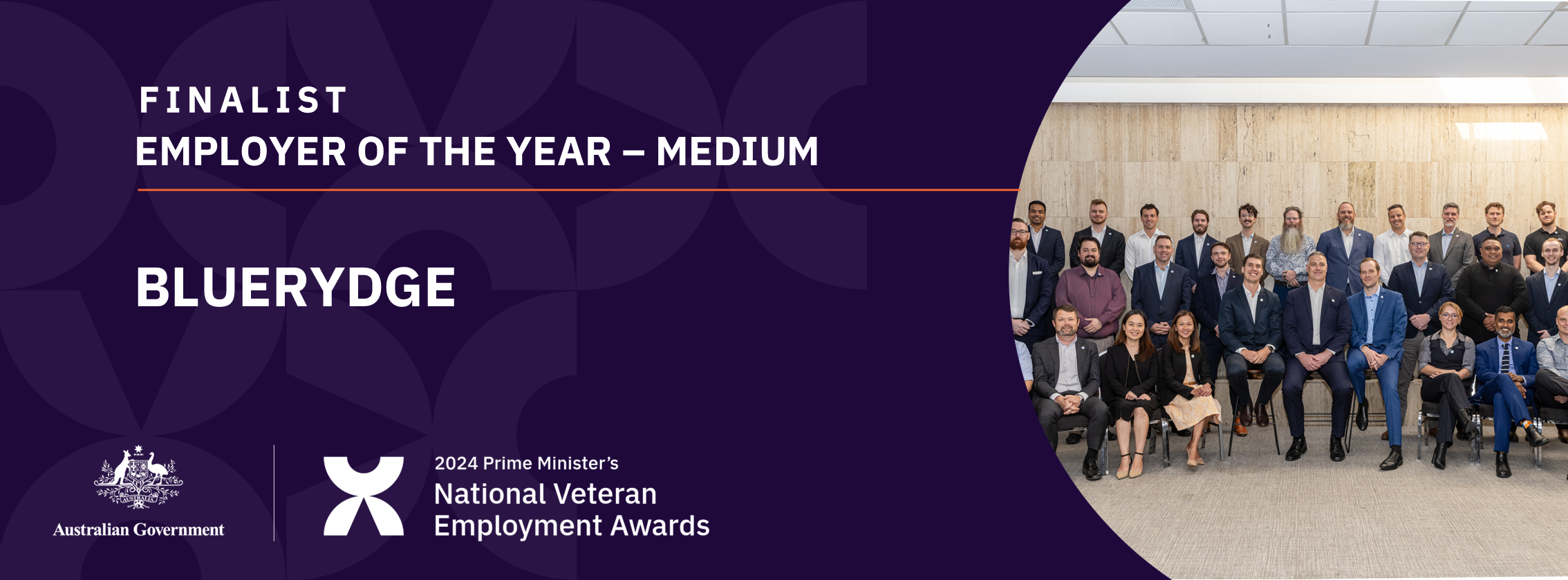 White text on dark purple background: Finalist Employer of the year - medium - Bluerydge - with a photo of three rows of people sitting and standing, smiling