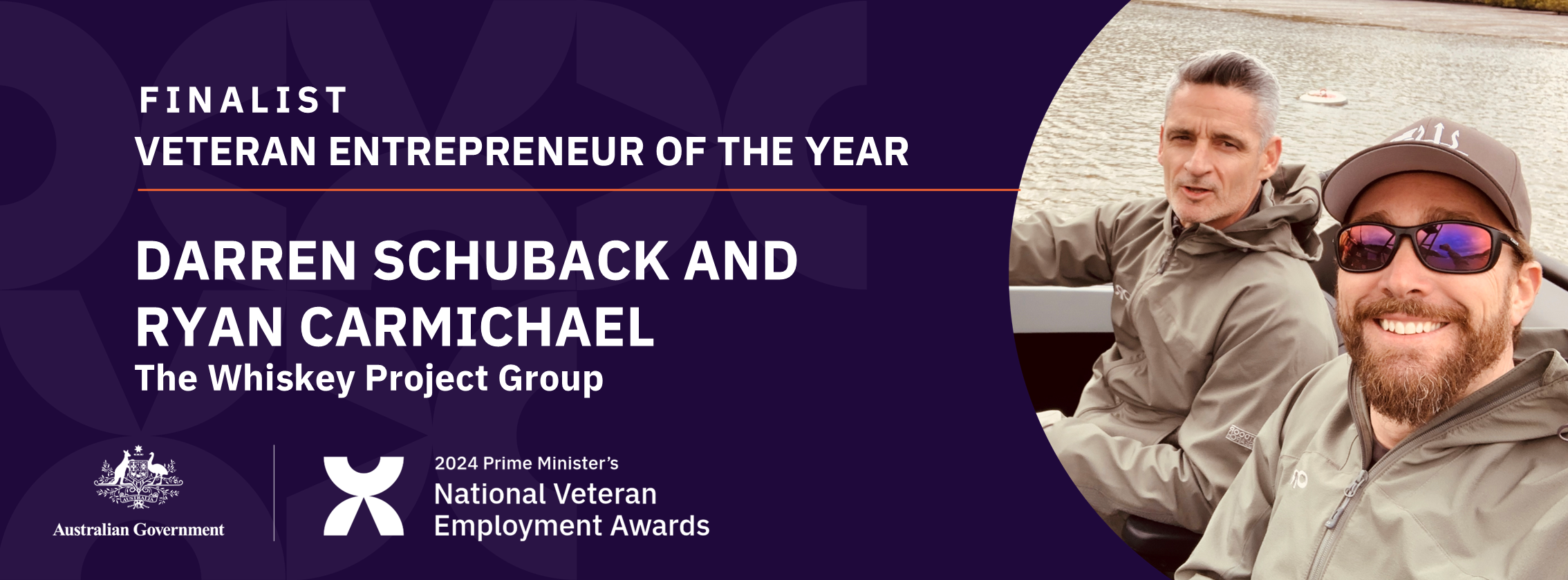 White text on dark purple background: Finalist Veteran Entrepreneur of the year - Darren Schuback and Ryan Carmichael, The Whiskey Project Group - with a photo of two men in windbreakers, smiling on a boat