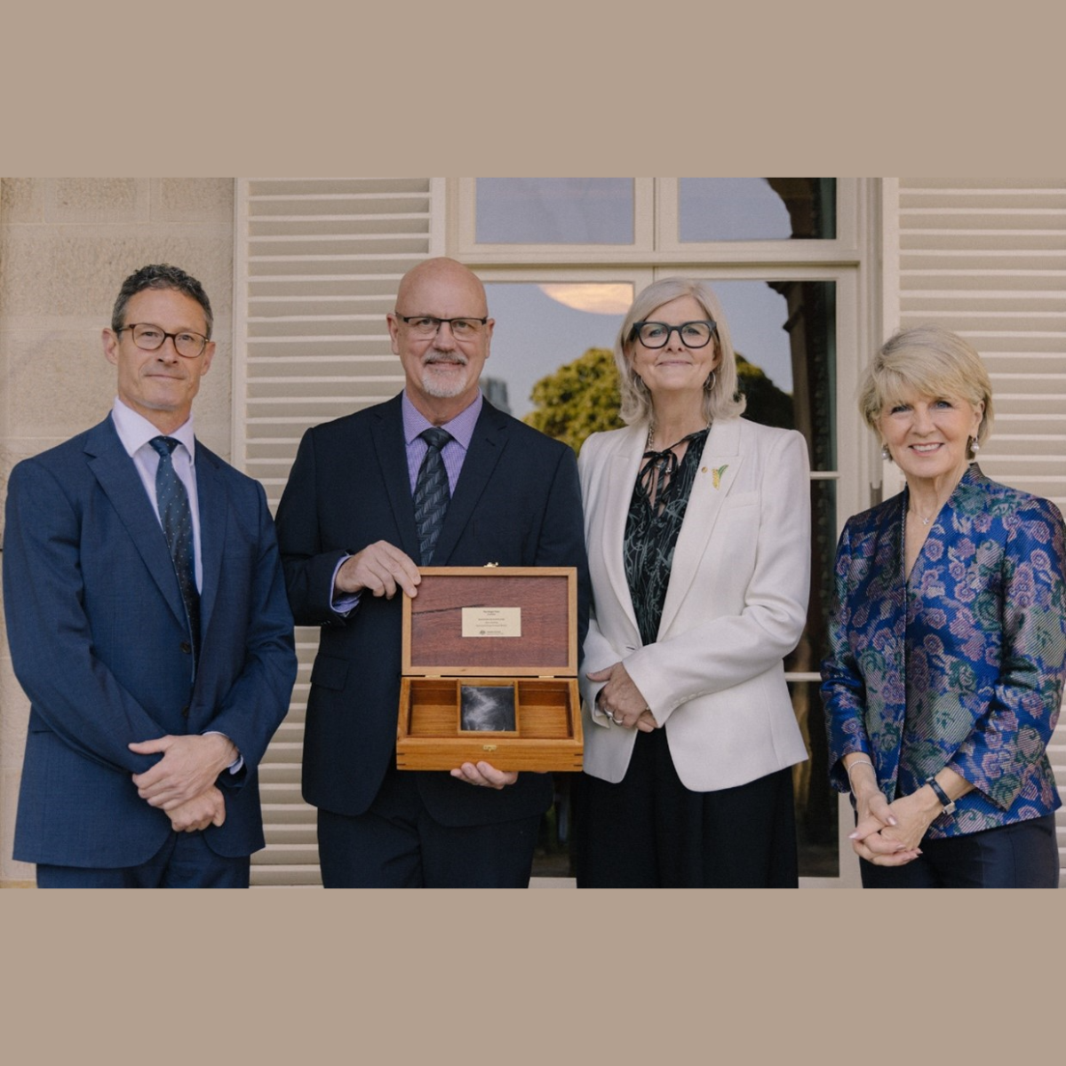 Community Impact Award Winner Garry Harding pictured with Brigadier Mark Brewer, Her Excellency Samantha Mostyn and The Hon Julie Bishop.