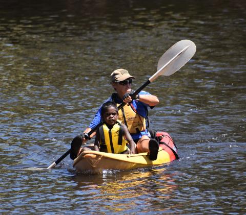 Pamela Dillon kayaking with a student