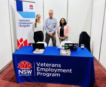 NSW Veterans' Employment Program staff pictured at an event booth